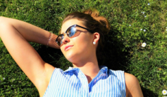 Young Woman Relaxing In Sun