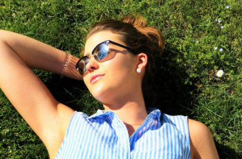 Young Woman Relaxing In Sun